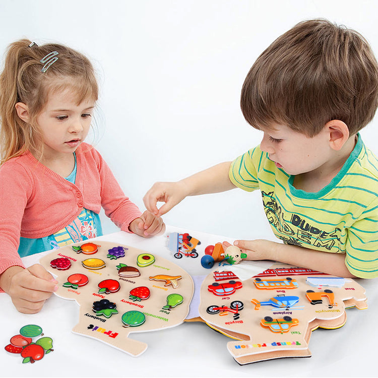 kids playing busy book