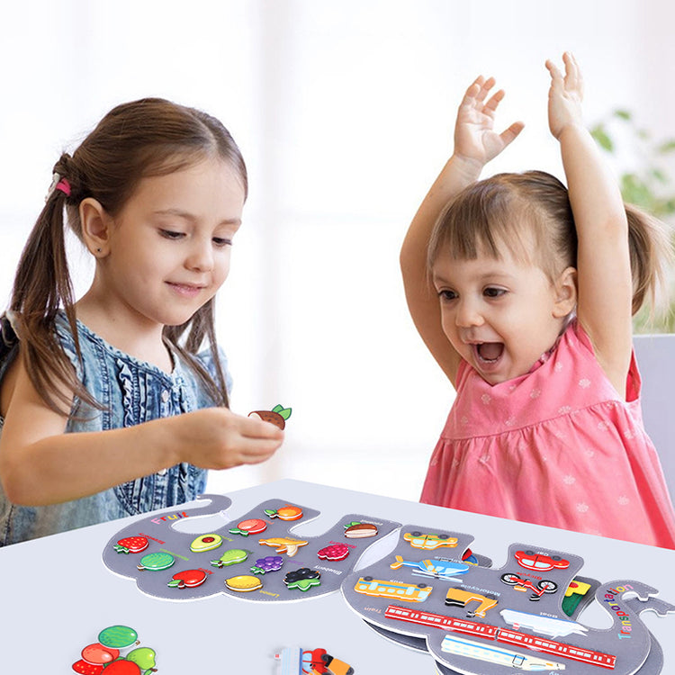 Kids playing elephant busy book