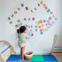 Girl is using magnetic board in playroom