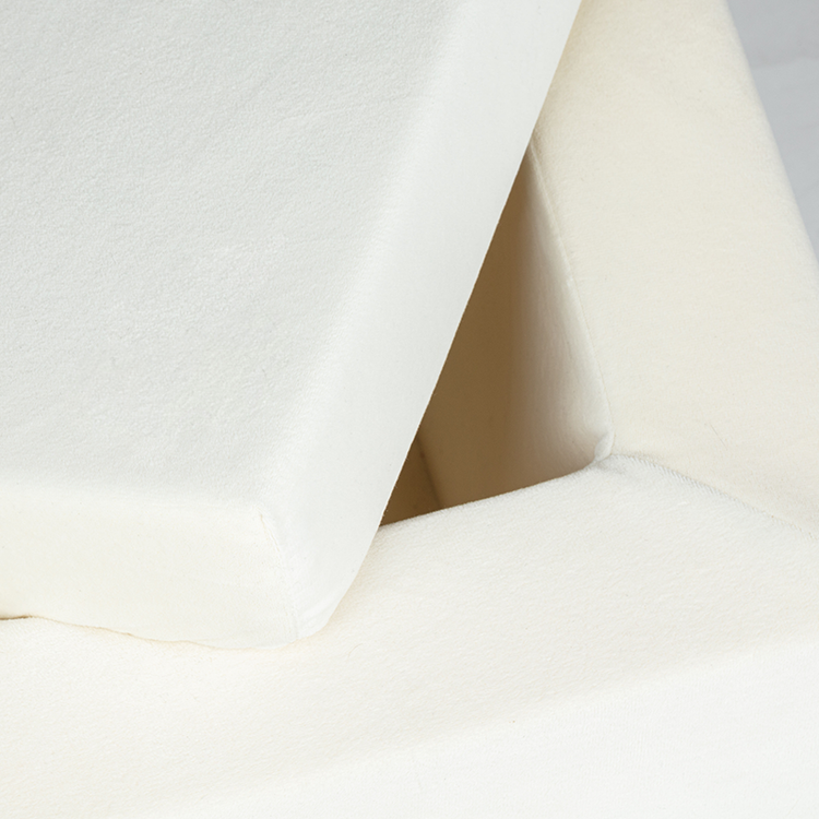 Close-up image of the Tangram play couch's soft, cushioned mat.