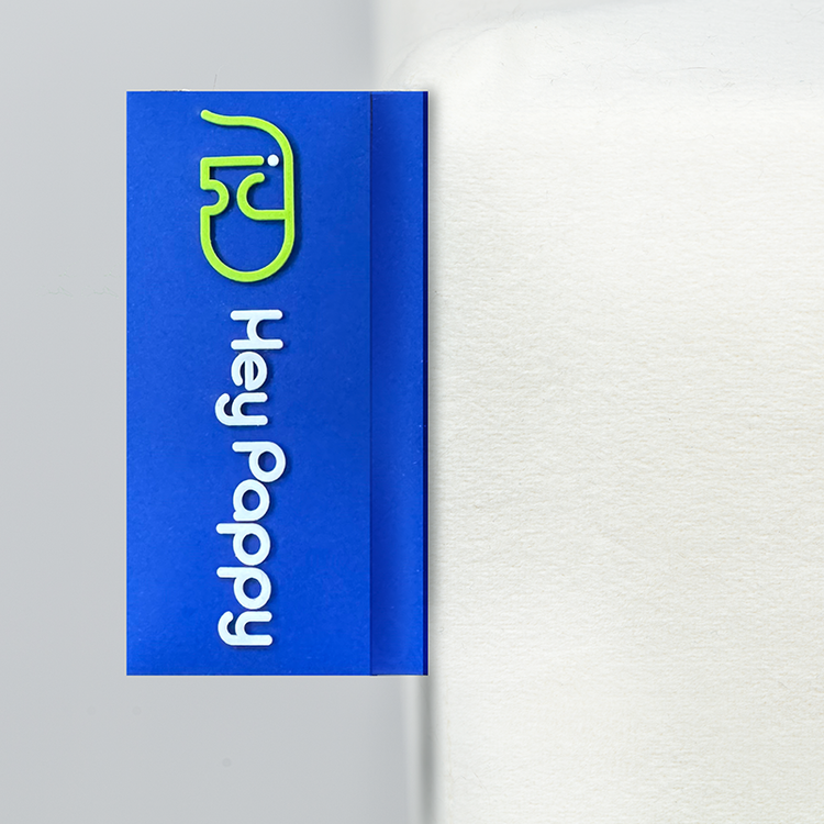 HeyPappy brand tag on the Tangram puzzle play couch.