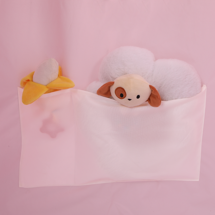 Tent with hanging bag holding a doll