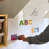 Tangrams stuck to magnetic board.