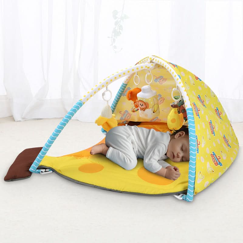 baby sleeping on banana play gym