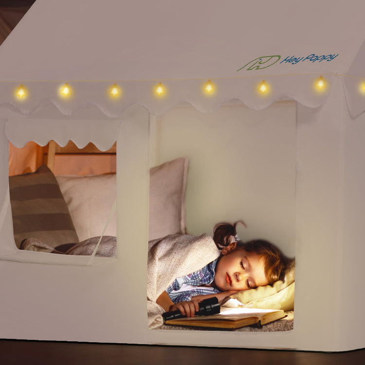 Girl sleeping in tent with light
