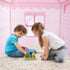Kids playing in pink tent
