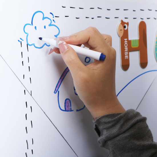 Detail view of graffiti on magnetic board